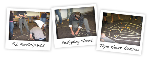 SI participants designing an outline of a heart with tape on the floor