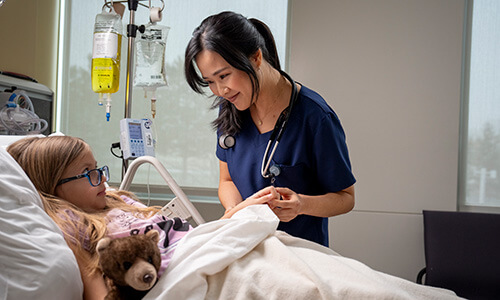 WSU nursing student taking care of patient