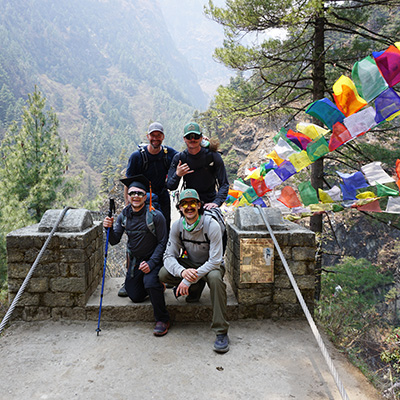 Outdoor Program Employees pose on trek to Everest base camp